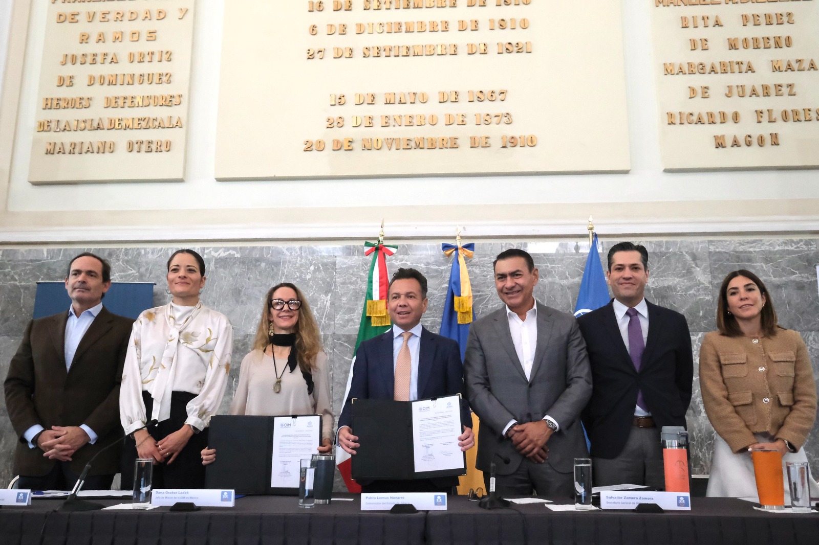 Jalisco firma convenio con OIM para atención a migrantes repatriados