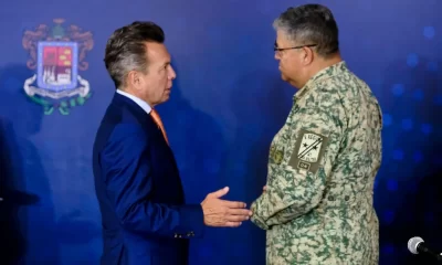 Pablo Lemus en reunión con militares