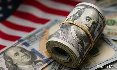 Billetes de dólares estadounidenses y pesos mexicanos representan el tipo de cambio de este miércoles 5 de agosto.