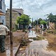 Trabajos de limpieza y recuperación de viviendas y vialidades tras la inundación del 20 de septiembre de 2026 en Zapotlanejo, Jalisco.